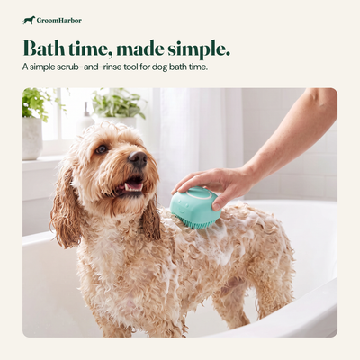 Dog bath brush with soap dispenser in use at home: Bath Brush Pro