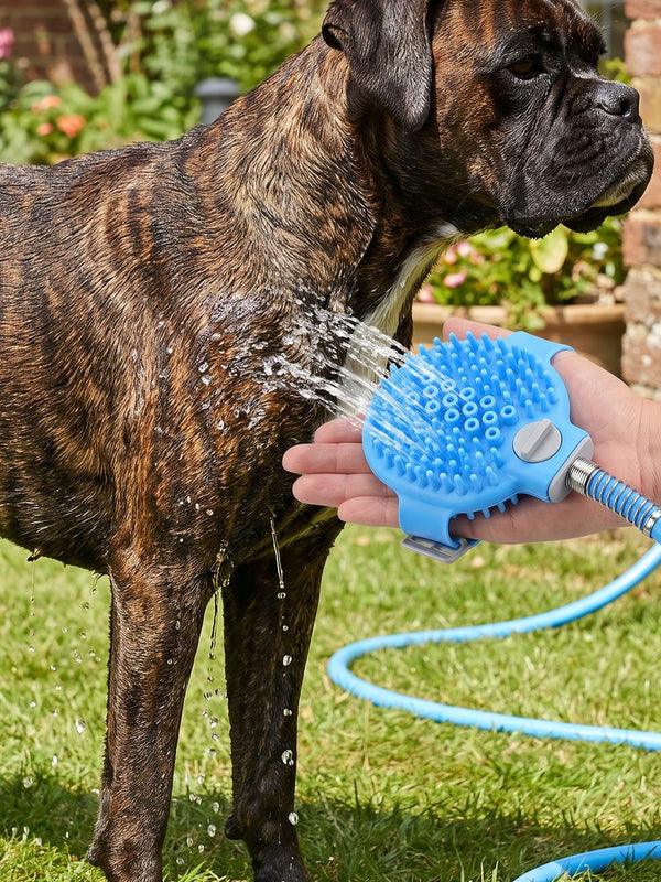 Dog being rinsed outdoors with the RinseMate sprayer